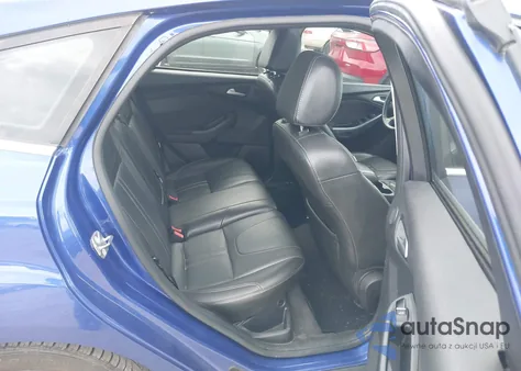 2014 Ford Focus Titanium z USA, uszkodzony, nr VIN 1FADP3N20EL308676